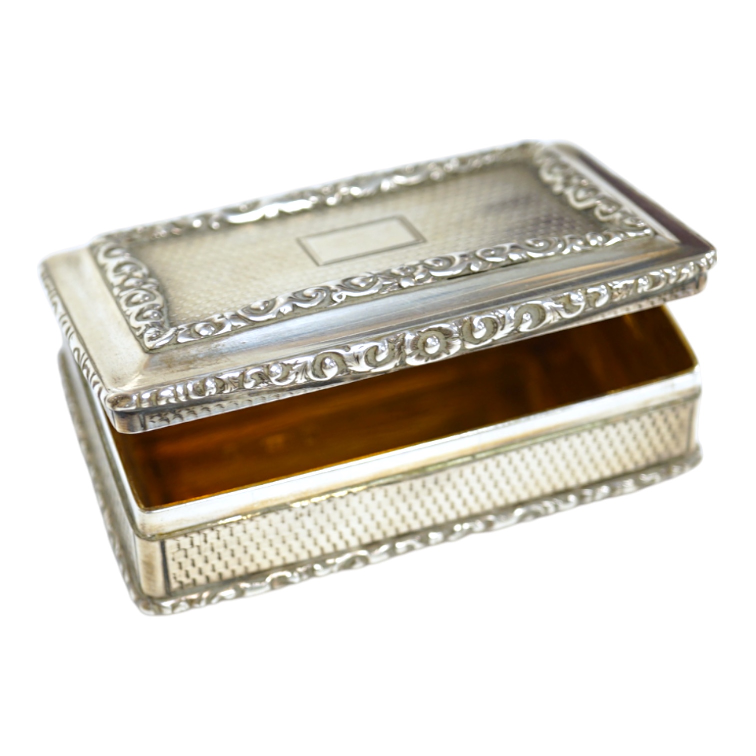 A George IV silver rectangular table snuff box, by Edward Stammers, Birmingham, 1827, 86mm, weight 159 grams. Condition - good.